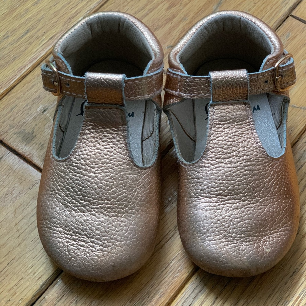 Gold T-strap Monkey Feet